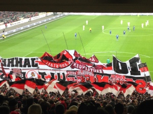 The Stuttgart ultras trying to raise their tifo. 